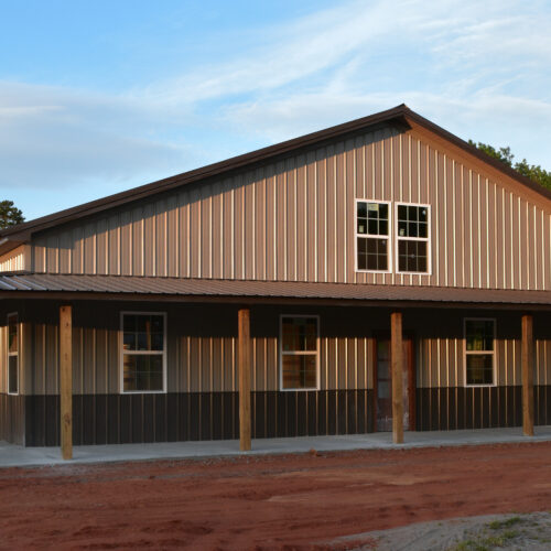 Residential,Post,Frame,Construction,Home,With,Brown,Metal,Roof,,Light