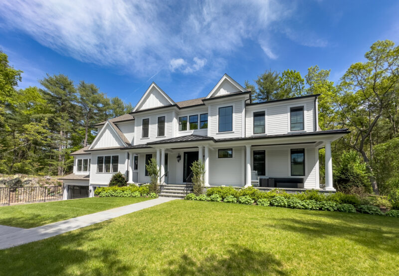 Contemporary farmhouse style suburban home on a sunny Spring morning